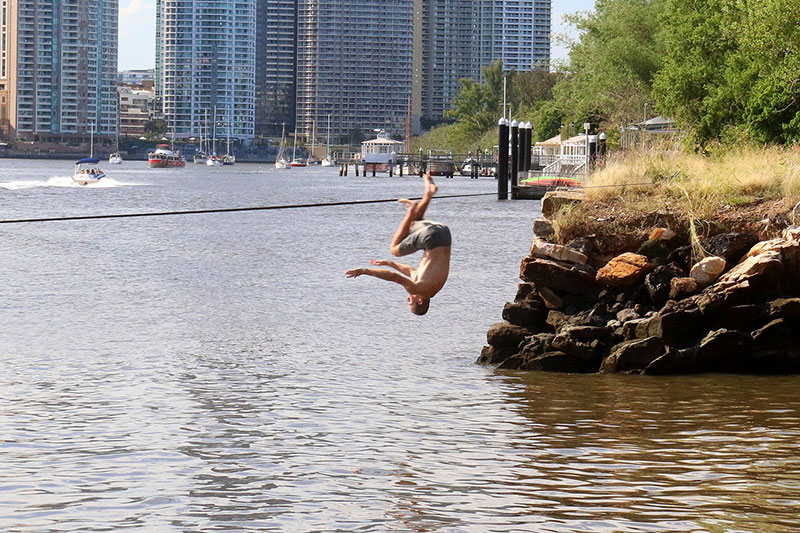 Dom practicing his trade mark “fall onto my head in the rocks” move