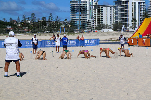 Women being judged on their hole digging skills