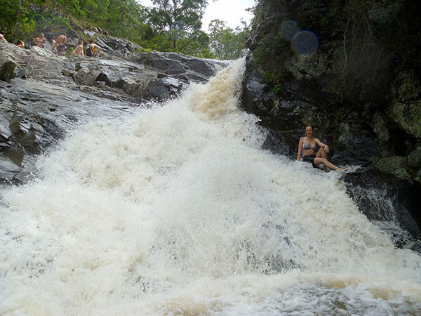 Bronwen relaxes beside one of the waterfalls