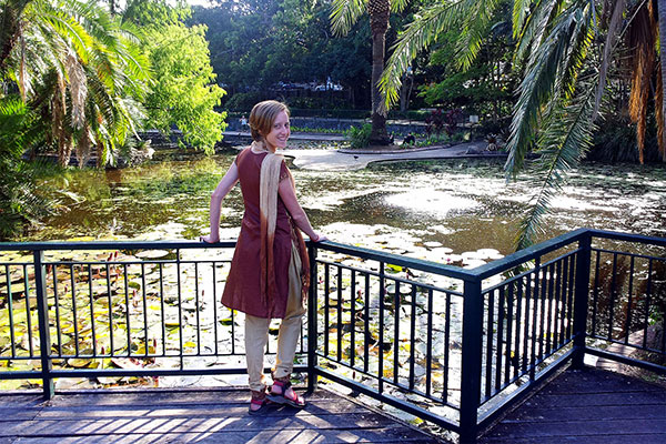 Bronwen admiring the water lizard and his baby duckling snacks, who kept running away