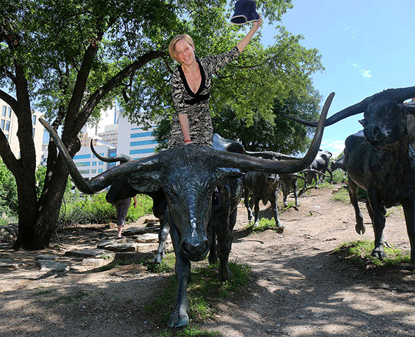 Bronwen rides a Texan cow