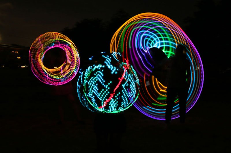 Dee hooping at the West End Fire Festival