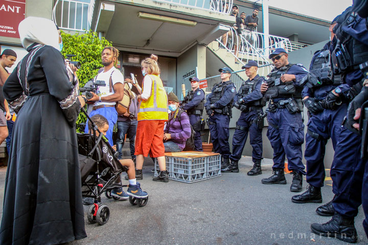 The mother and her son get to within metres of the refugee, but are not allowed any closer.