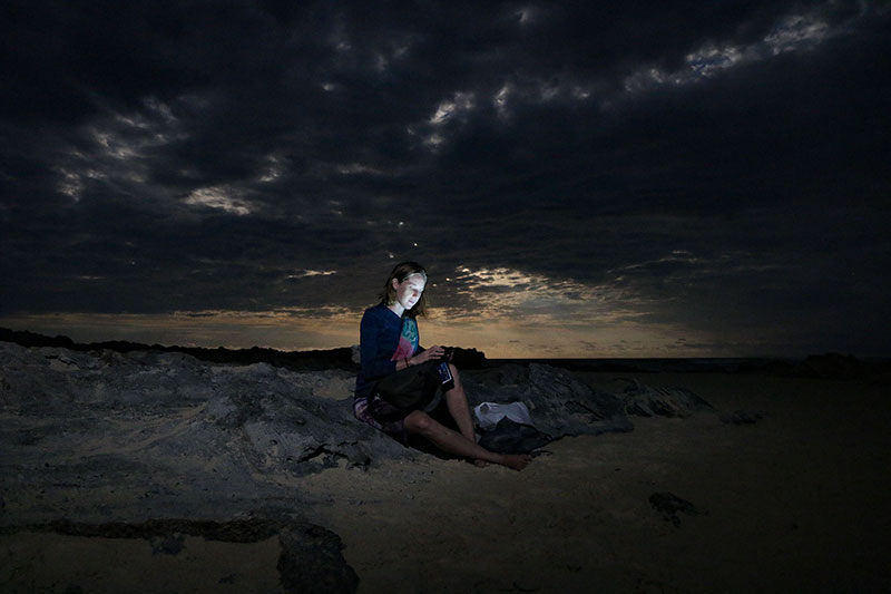 Bronwen with the moon rising behind her