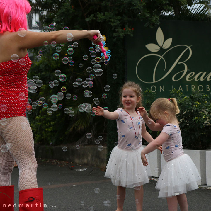 Miss Bubbles delighting young children with hundreds of bubbles at the Paddington Christmas Fair