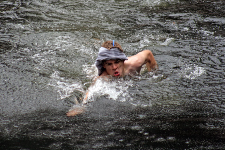 Clint pretending the water is cold. Note the pen.