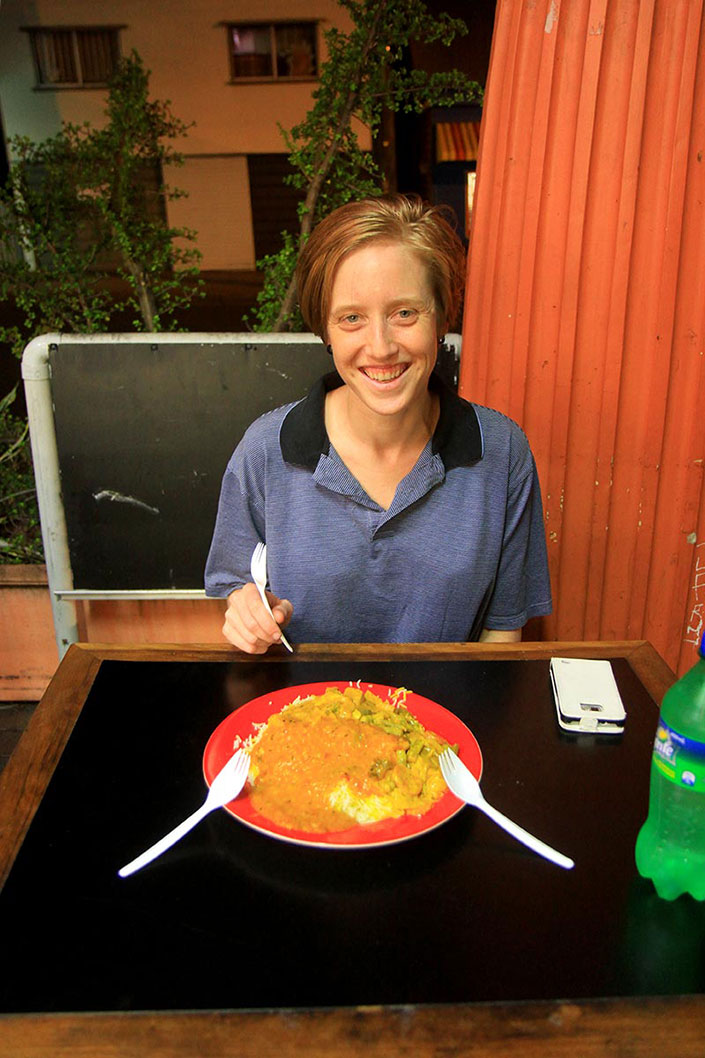 Continuing the venerable and beloved tradition of posting photos of food, here is Bronwen enjoying her romantic Valentine’s Day curry, complete with plastic forks