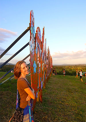 Bronwen at the Woodfordia sign