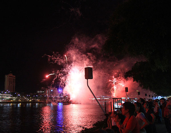 There were three barges set up along the river spewing forth fireworks for the crowds