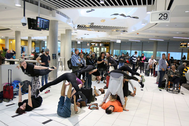 The traditional “show the airport your bum” acro exchange opening