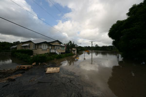 Debris and flood waters gathering around my place