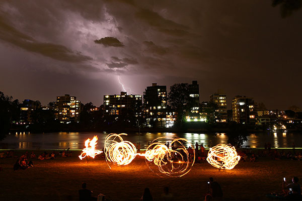 Lightning and fire twirlers at West End Fire Festival