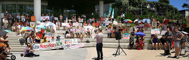 Speakers address the small crowd at the vigil