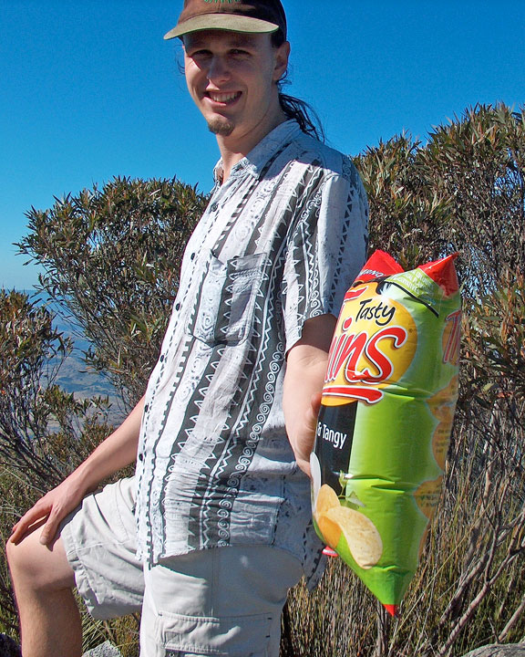 A very swollen packet of Thin’s “Light and Tangy” chips