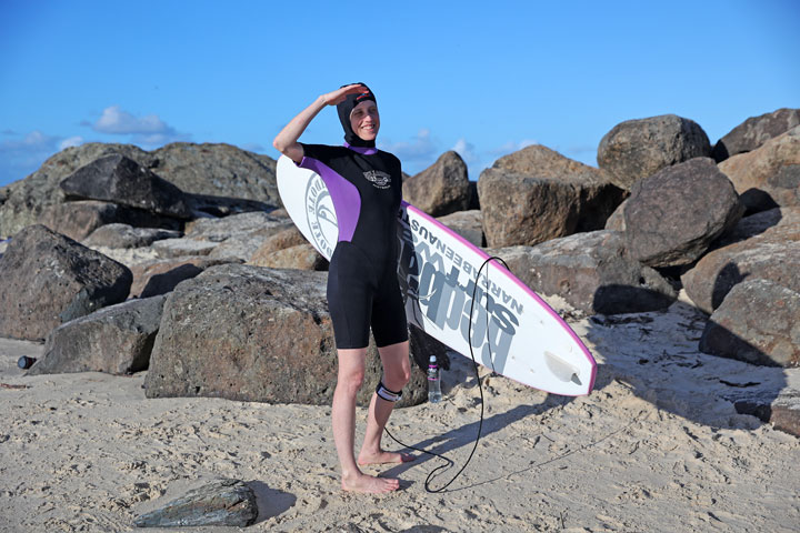 Bronwen ready to surf, Currumbin Alley