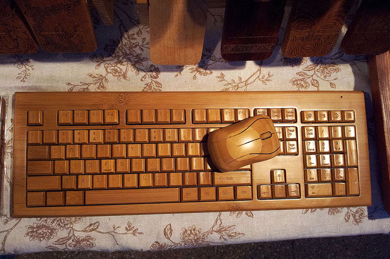 A wooden keyboard and mouse
