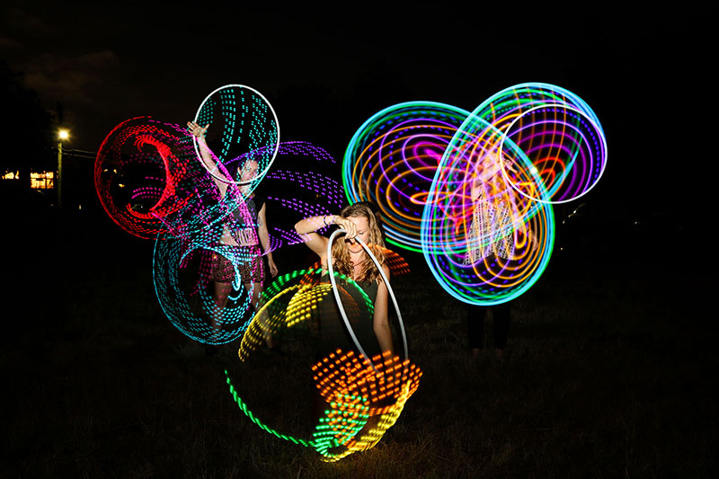 Dee hooping at the West End Fire Festival