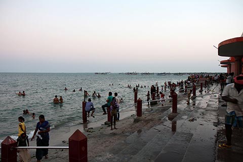 Hindus bathing in the cold water