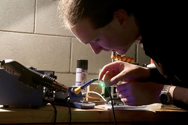 Maz testing one of the LEDs before putting it in resin