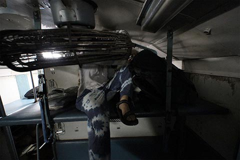 Bronwen setting up her “bed” on the train. Indian trains are not the cleanest of places to sleep, though they are less cramped than buses.