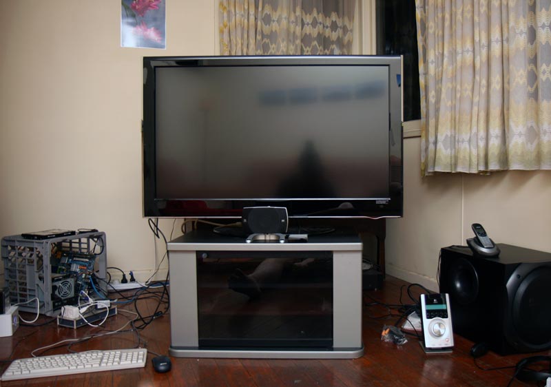 My milk crate media centre, LG 42 inch LCD TV (now on a stand), & Logitech surround sound speakers