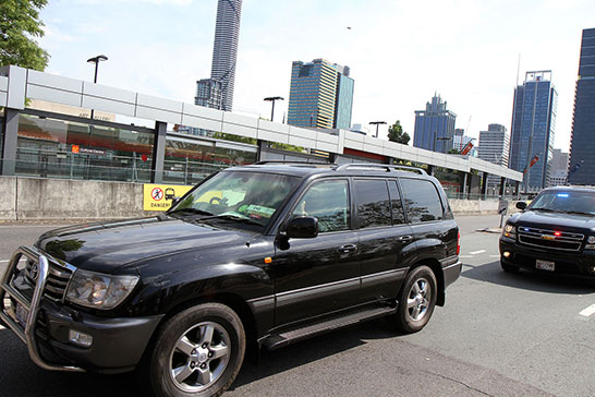 A whole pile more cars follow Obama’s limousine