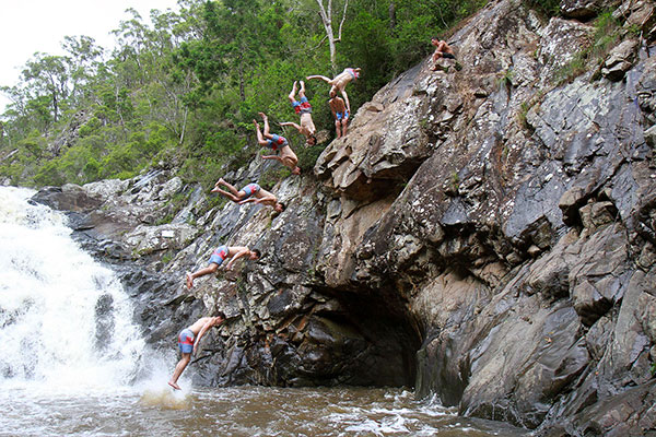 A daring back-flip metres into the water below