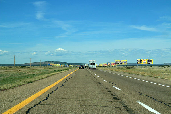 Lots of signs beside the road