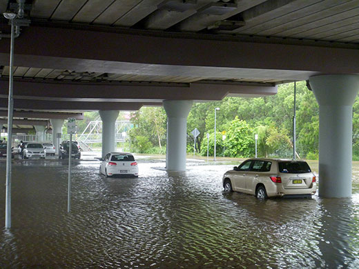 Cars parked in water at Stones Corner