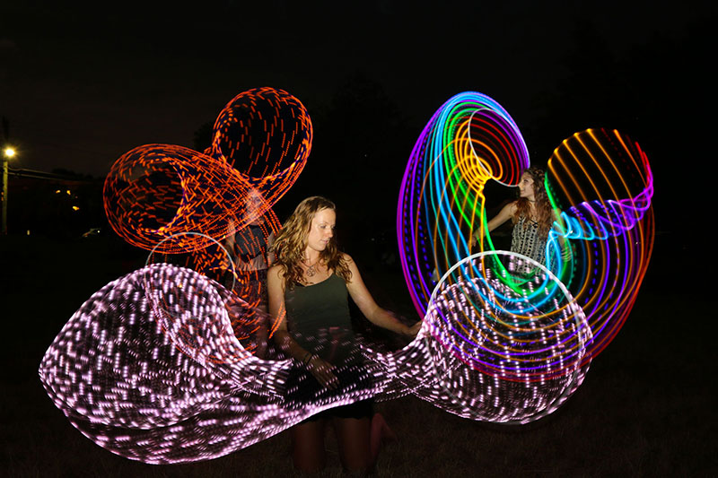 Dee hooping at the West End Fire Festival