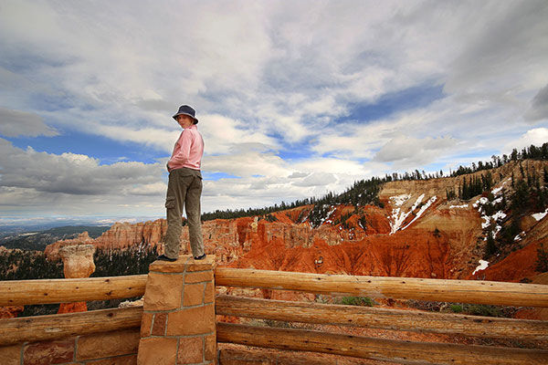 Bronwen looking down into Bryce Canyon, which still has some snow on it