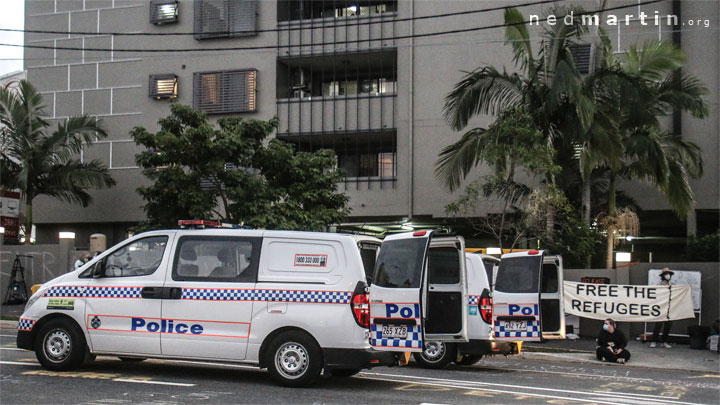 Police vans ready for arrested protesters