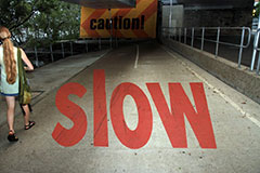 Bronwen and a Slow sign, Brisbane River