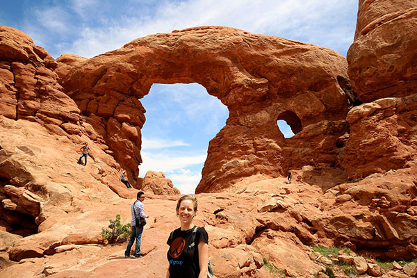 Bronwen in front of an arch