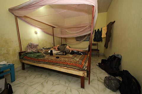 Bronwen sleeping in our room at the Tina Blue View Lodge, Mamallapurum