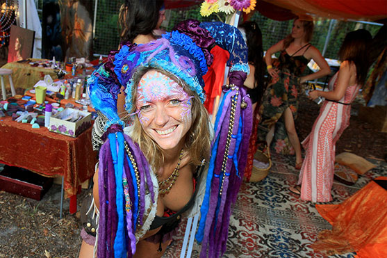 One of the face painting girls posing for a photo