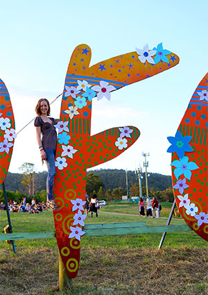 Bronwen not breaking the rules by climbing on the Woodfordia sign