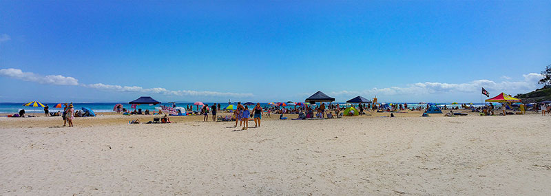 People packing the beach