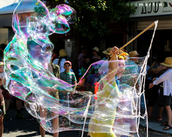 Carissa blowing bubbles, Kurilpa Derby, West End