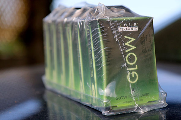 Our six boxes of glow in the dark condoms we were given from the General Store