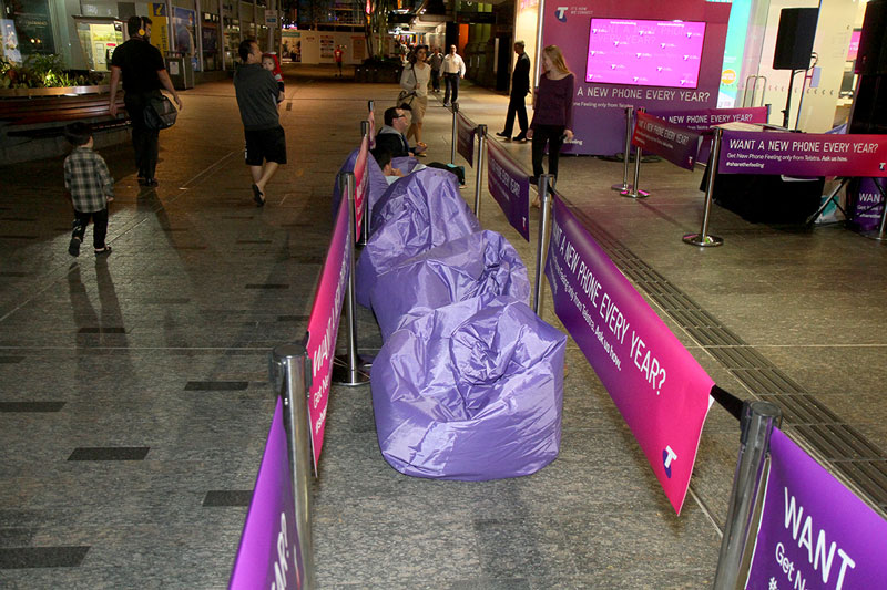 The Telstra store has set out some beanbags, and is going to have a DJ later on.