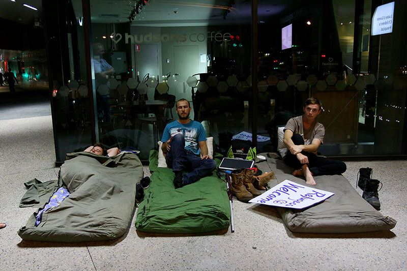 Protestors prepare to spend the night at the Vigil for Baby Asha