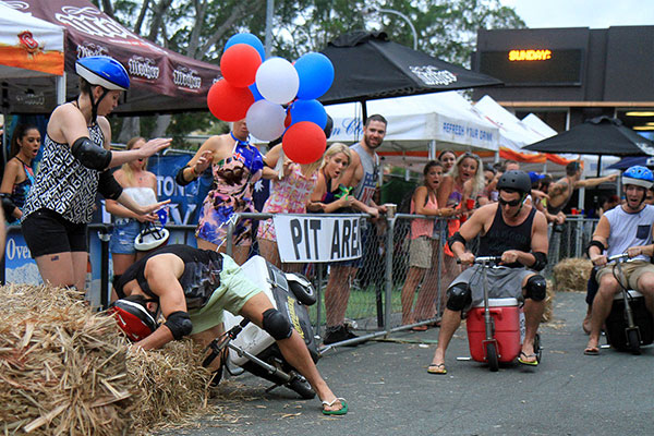 I love the expressions on the faces of the people in the background