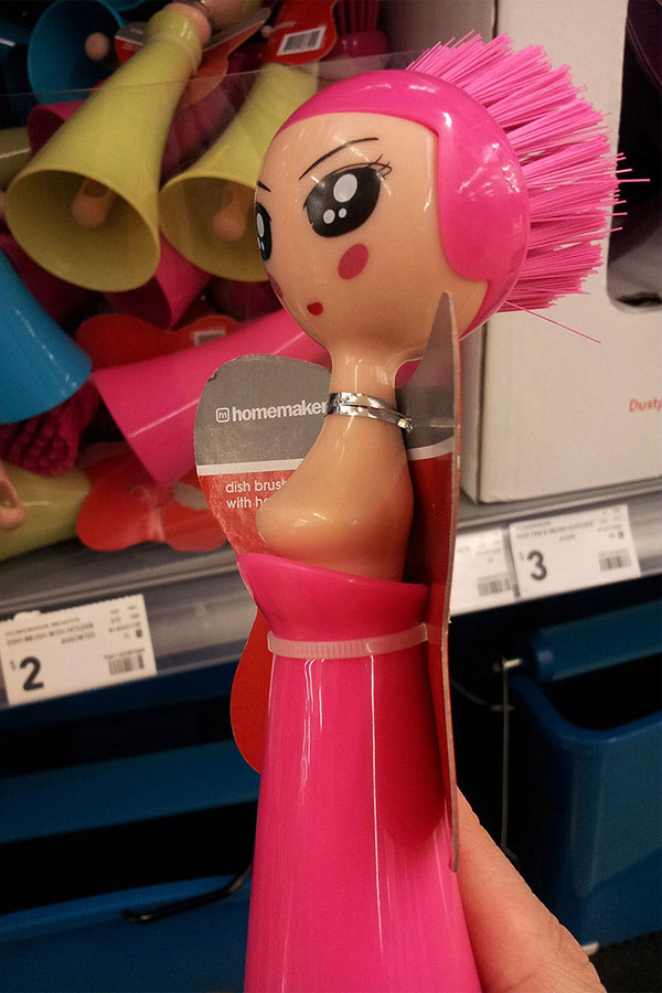 A dish brush with breasts