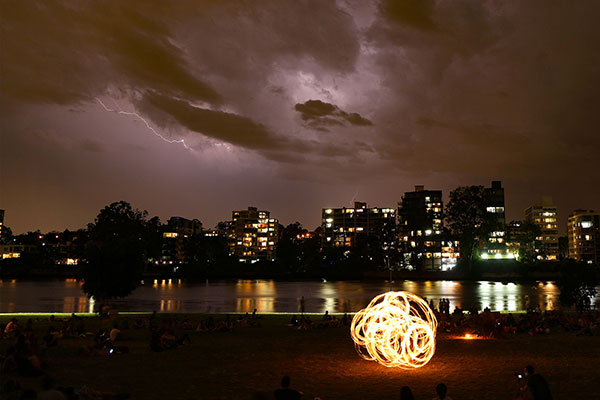 Lightning and fire twirlers at West End Fire Festival