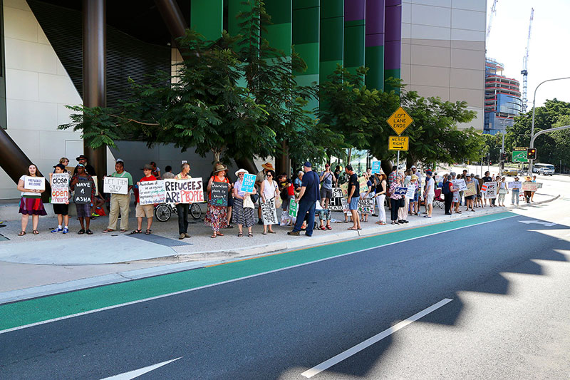 Protestors line the road outside the Lady Cilento Children’s Hospital
