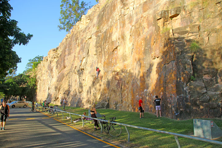 People are climbing at Kangaroo Point as if things are normal