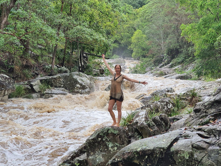 Bronwen posing while Cedar Creek floods