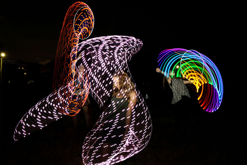 Dee hooping at the West End Fire Festival