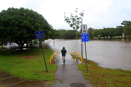 A footpath under water at Stones Corner